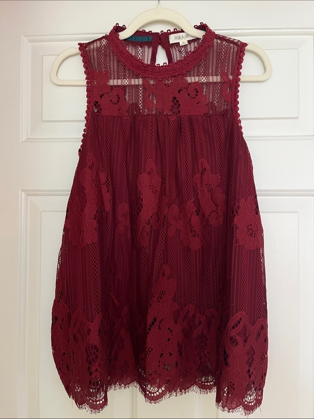 Taylor & Sage Burgundy sleeveless Party blouse.